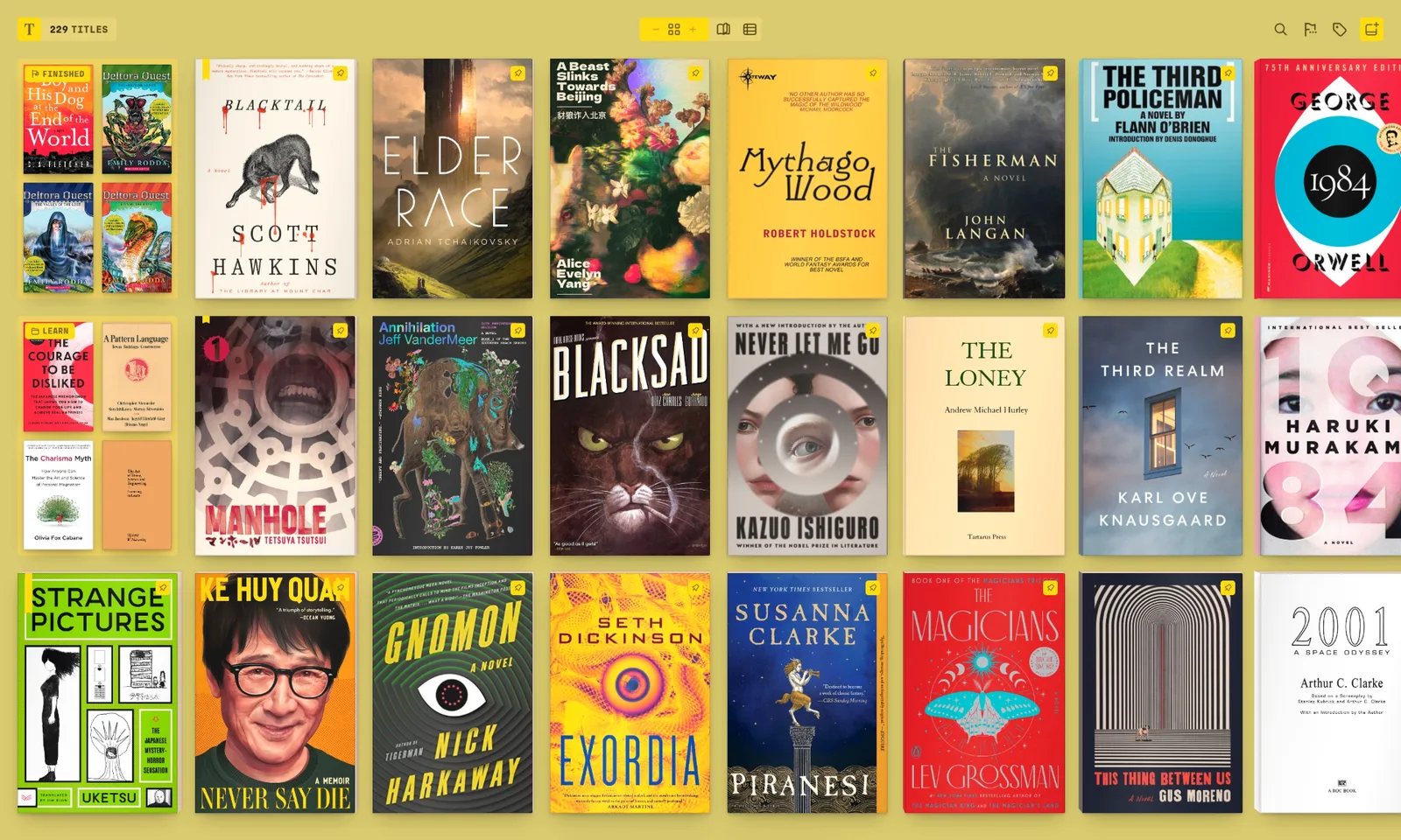 Tomen’s shelf in the Meadow theme with the Honey accent: 229 titles as their real covers, the finished ones and a collection each stacked into one tile, pins on many.